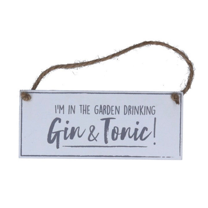 In the garden drinking Gin and Tonic sign