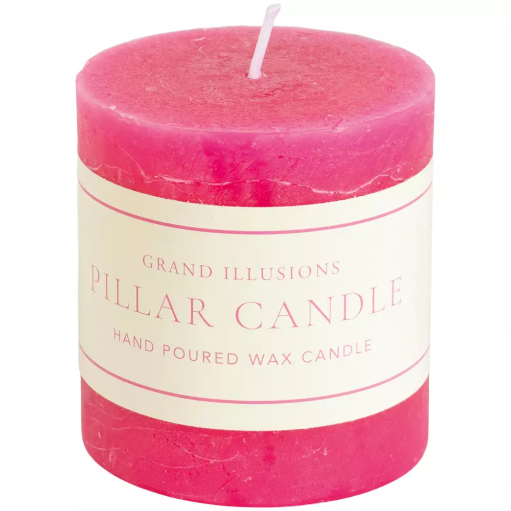 Small bright pink pillar candle