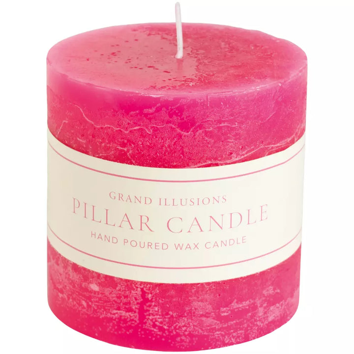 Large bright pink pillar candle