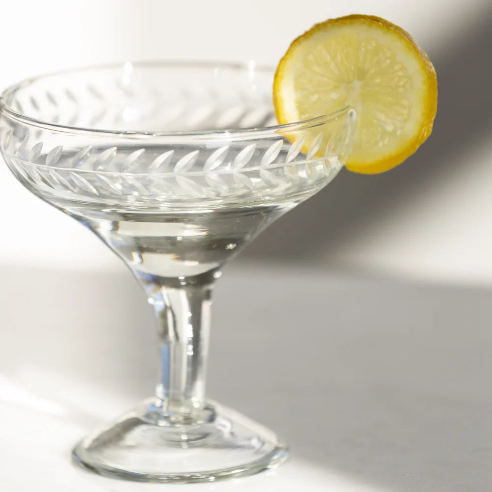 Champagne Coupe Glass with lemon slice