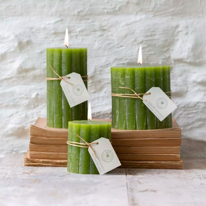 Green scalloped pillar candles 