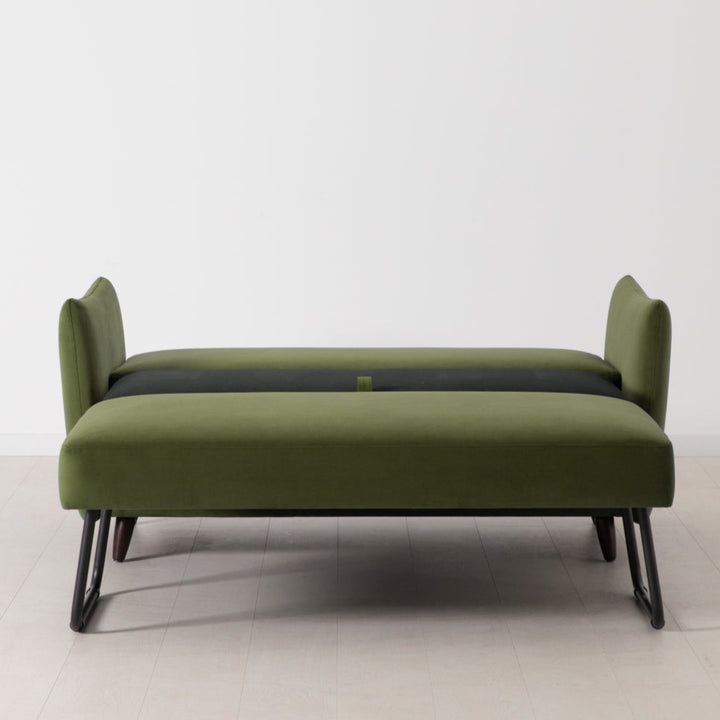 Model 08 Sofabed as a bed in green velvet on white background