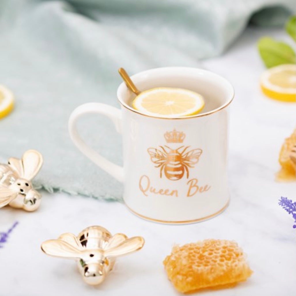 Queen bee mug with honeycomb and lemon